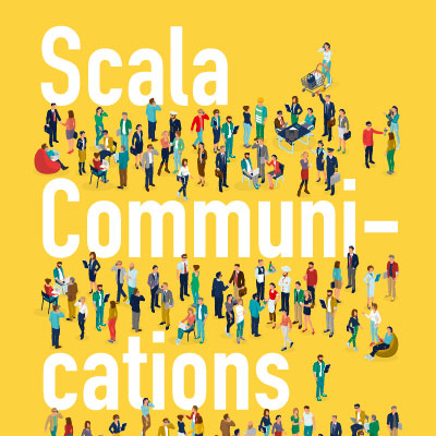 株式会社スカラコミュニケーションズ 様 会社案内制作実績：スカラコミュニケーションズの社員たちが笑顔で語り合う様子