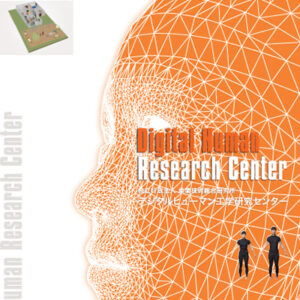 デジタルヒューマン工学研究センター 様 会社案内制作実績：オレンジ色の光が差し込む、明るく先進的なデジタルヒューマン工学研究センターの研究室風景